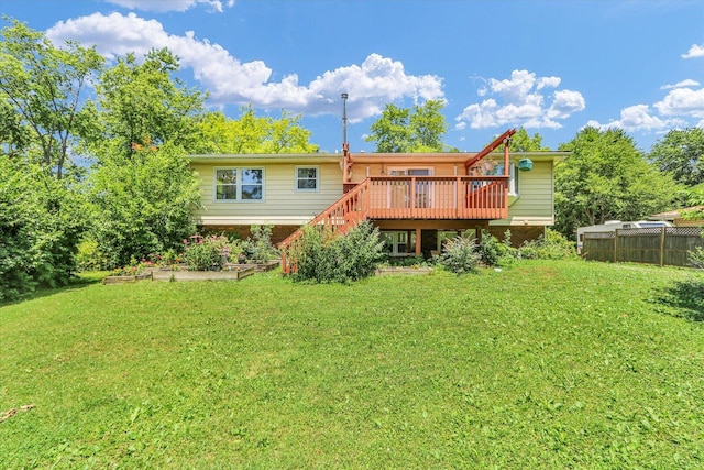 309 E Mchenry St, Urbana, IL 61801 - rear view of property with a wooden deck, a garden, and stairs
