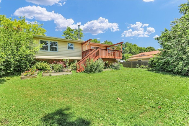309 E Mchenry St, Urbana, IL 61801 - rear view of property with stairs and a wooden deck