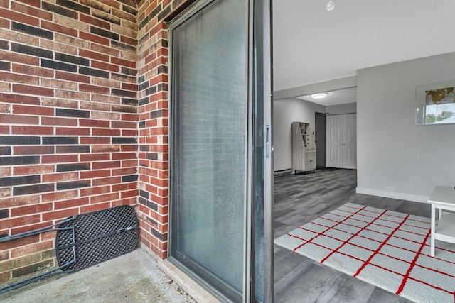 1118 Cedar St Unit 1B, Glendale Heights, IL 60139 - property entrance with brick siding