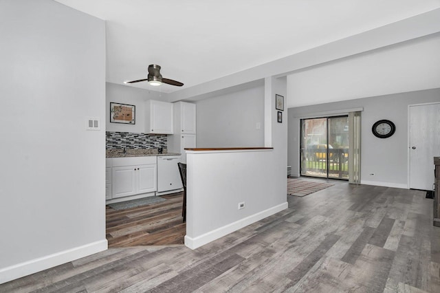 1118 Cedar St Unit 1B, Glendale Heights, IL 60139 - kitchen with dishwasher, wood finished floors, white cabinets, and baseboards