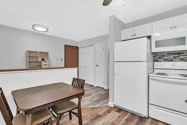 1118 Cedar St Unit 1B, Glendale Heights, IL 60139 - dining area with light wood finished floors and ceiling fan