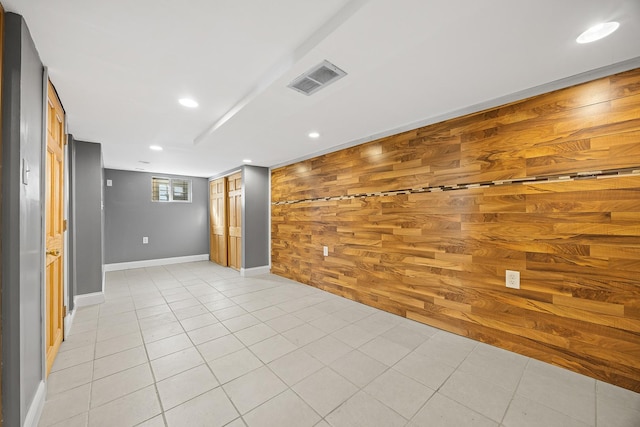 6812 S Lafayette Ave, Chicago, IL 60621 - spare room featuring wood walls, recessed lighting, and light tile patterned floors