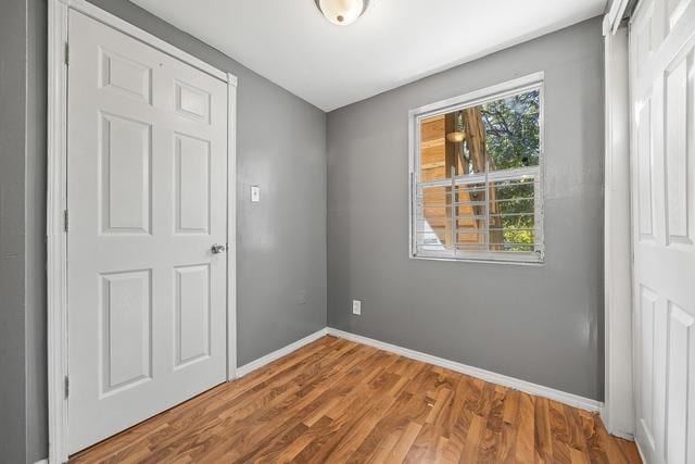 6812 S Lafayette Ave, Chicago, IL 60621 - spare room with wood finished floors and baseboards