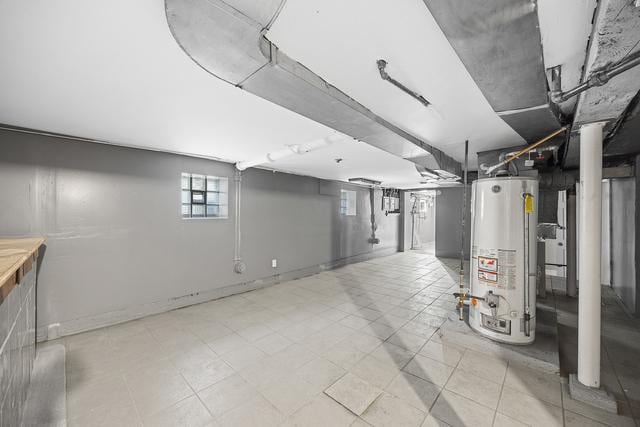 6812 S Lafayette Ave, Chicago, IL 60621 - below grade area featuring water heater and baseboards