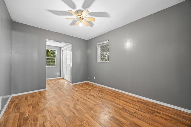 6812 S Lafayette Ave, Chicago, IL 60621 - spare room featuring ceiling fan and wood finished floors
