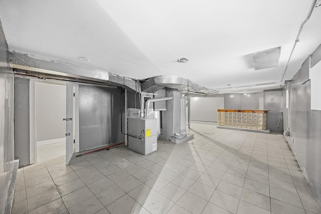 6812 S Lafayette Ave, Chicago, IL 60621 - finished below grade area featuring heating unit and light tile patterned floors