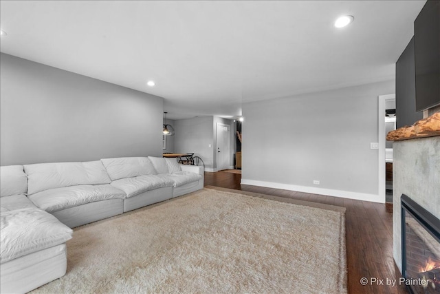 2800 Northampton Dr Unit A2, Rolling Meadows, IL 60008 - living area with wood finished floors, recessed lighting, baseboards, and a glass covered fireplace
