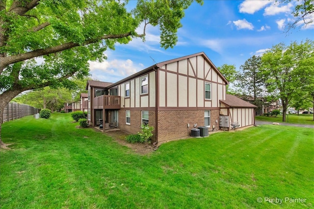 2800 Northampton Dr Unit A2, Rolling Meadows, IL 60008 - view of property exterior with brick siding and central air condition unit