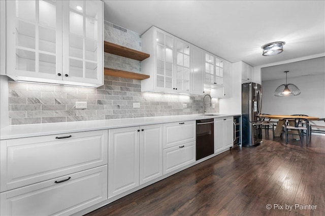 2800 Northampton Dr Unit A2, Rolling Meadows, IL 60008 - kitchen featuring appliances with stainless steel finishes, a sink, dark wood finished floors, white cabinets, and glass insert cabinets