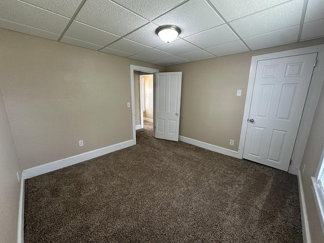 1109 S Locust Ave, Freeport, IL 61032 - unfurnished bedroom with a drop ceiling, carpet flooring, and baseboards