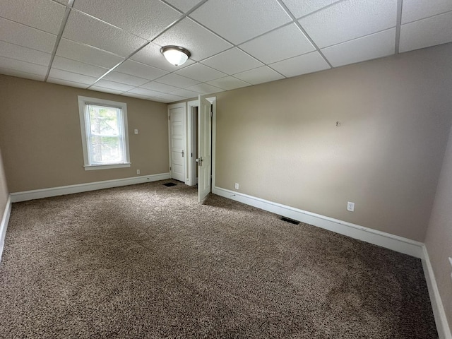 1109 S Locust Ave, Freeport, IL 61032 - unfurnished bedroom with a drop ceiling, baseboards, and carpet flooring