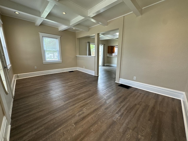 1109 S Locust Ave, Freeport, IL 61032 - empty room featuring beam ceiling, dark wood-type flooring, baseboards, and coffered ceiling