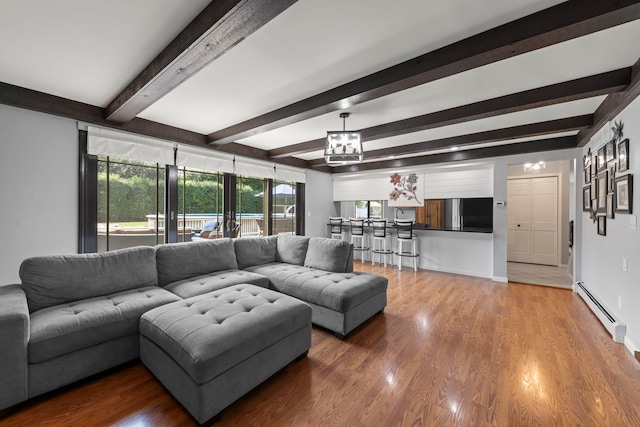 5760 Woodward Ave, Downers Grove, IL 60516 - living room with baseboard heating, a chandelier, beam ceiling, and wood finished floors