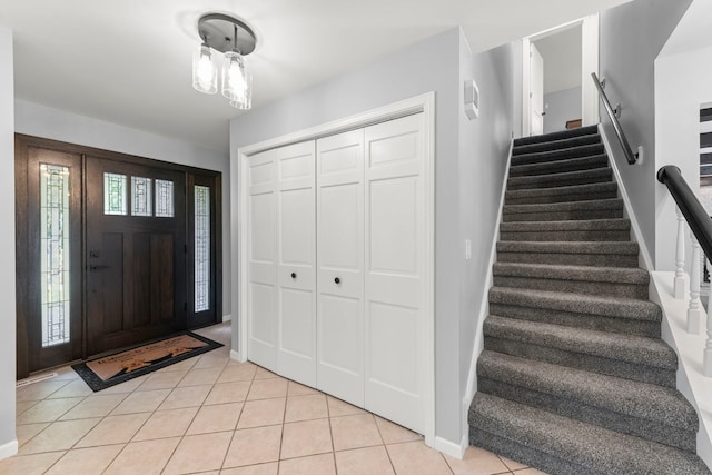 5760 Woodward Ave, Downers Grove, IL 60516 - entrance foyer featuring stairs and light tile patterned floors