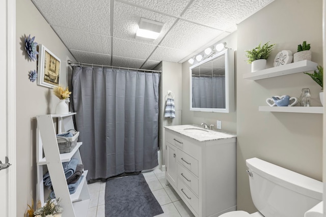 5760 Woodward Ave, Downers Grove, IL 60516 - full bathroom featuring vanity, tile patterned floors, a drop ceiling, and a shower with shower curtain