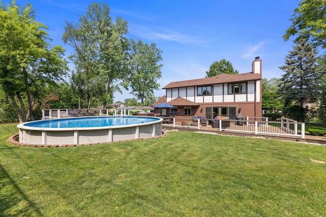 5760 Woodward Ave, Downers Grove, IL 60516 - outdoor pool with a deck and a yard