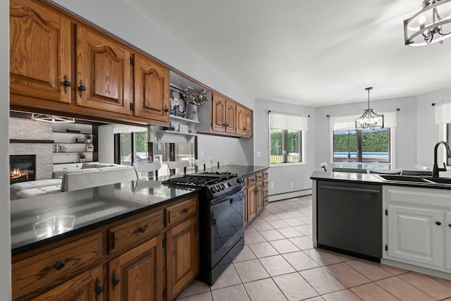 5760 Woodward Ave, Downers Grove, IL 60516 - kitchen featuring dishwasher, black gas range oven, a chandelier, baseboard heating, and dark countertops
