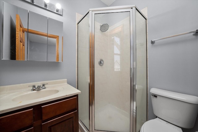 6528 S University Ave Unit 3N, Chicago, IL 60615 - bathroom with vanity, toilet, and a stall shower