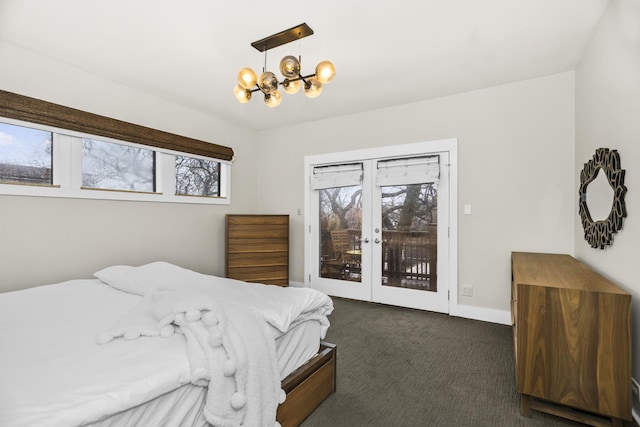 913 Michigan Ave Unit 3, Evanston, IL 60202 - bedroom with access to outside, a chandelier, dark colored carpet, and baseboards