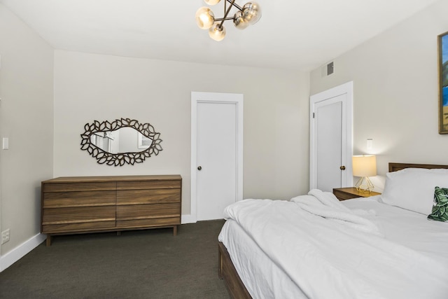 913 Michigan Ave Unit 3, Evanston, IL 60202 - bedroom featuring carpet flooring and a chandelier