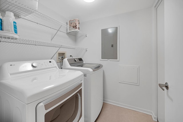 1640 Maple Ave Unit 1105, Evanston, IL 60201 - laundry room with electric panel, separate washer and dryer, baseboards, and light tile patterned flooring