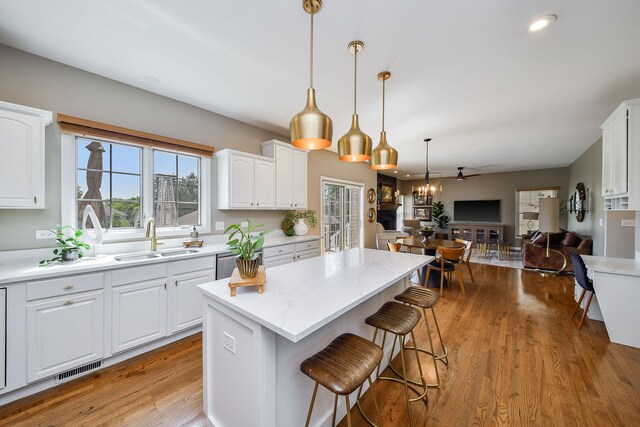 1N183 Stacy Ct, Glen Ellyn, IL 60137 - kitchen featuring open floor plan, plenty of natural light, white cabinets, and recessed lighting