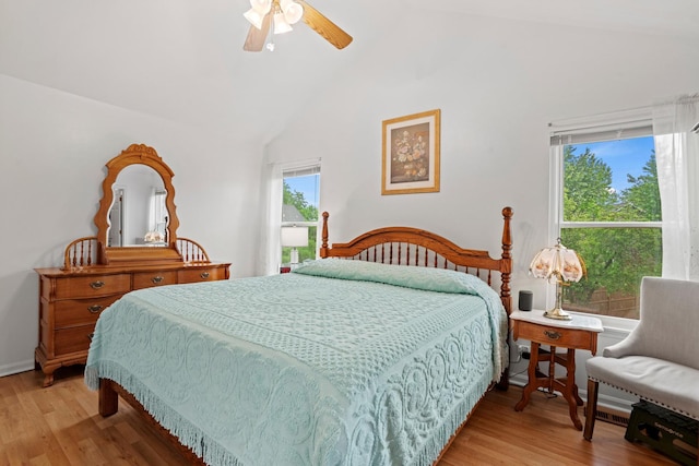 1239 Spring Creek Rd, Elgin, IL 60120 - bedroom featuring lofted ceiling, light wood-type flooring, and ceiling fan