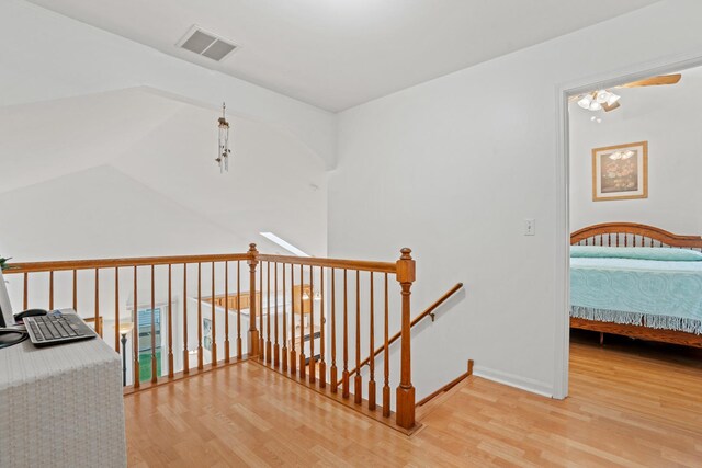 1239 Spring Creek Rd, Elgin, IL 60120 - hall with wood finished floors, an upstairs landing, and baseboards
