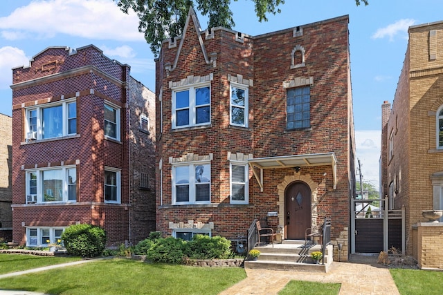 2115 Kenilworth Ave, Berwyn, IL 60402 - view of front facade with brick siding and a front yard