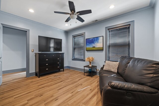 2115 Kenilworth Ave, Berwyn, IL 60402 - living area featuring ornamental molding, light wood finished floors, baseboards, ceiling fan, and recessed lighting