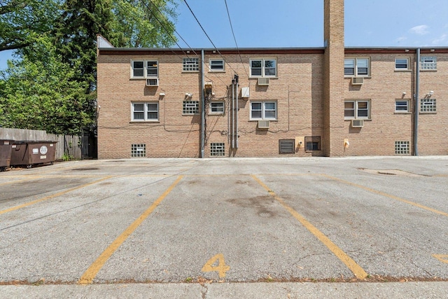 1819 W Touhy Ave Unit 2, Chicago, IL 60626 - view of building exterior featuring uncovered parking