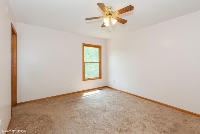 8885 Dryden St, Woodridge, IL 60517 - unfurnished room featuring baseboards, carpet flooring, and a ceiling fan
