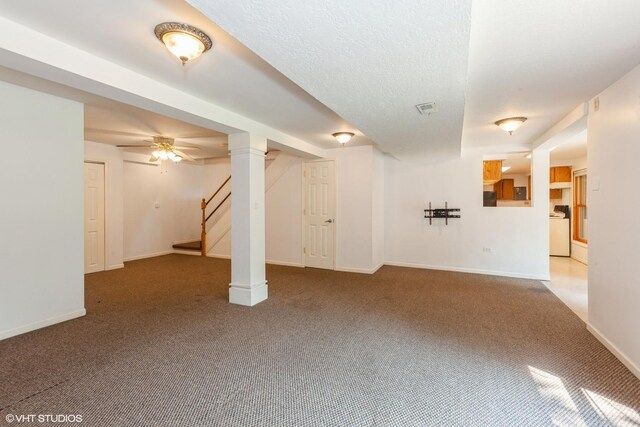 8885 Dryden St, Woodridge, IL 60517 - unfurnished living room featuring carpet flooring, washer / dryer, stairway, and baseboards