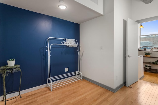 519 N Hickory St Unit 519, Champaign, IL 61820 - bedroom with wood finished floors and baseboards