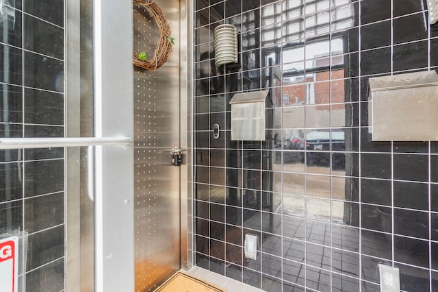 519 N Hickory St Unit 519, Champaign, IL 61820 - bathroom with tiled shower