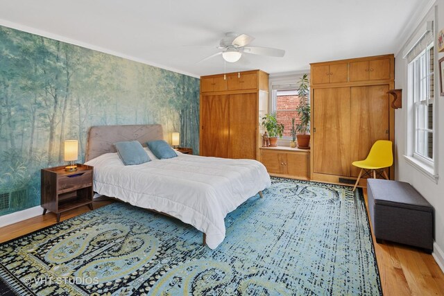 6967 W Wolfram St, Chicago, IL 60634 - bedroom with light wood-type flooring and a ceiling fan