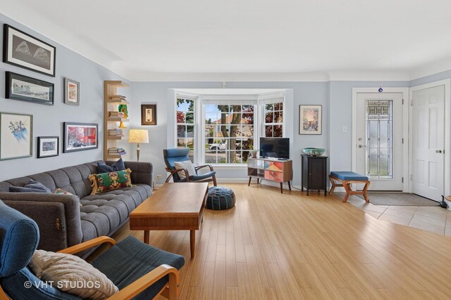 6967 W Wolfram St, Chicago, IL 60634 - living room featuring light wood-style floors