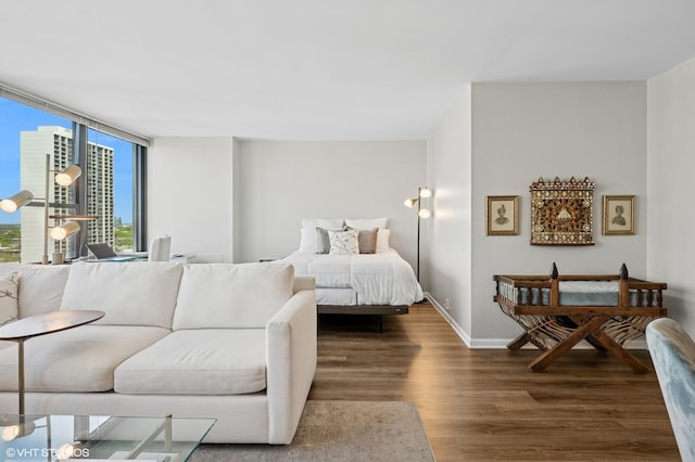 1560 N Sandburg Ter Unit 1605J, Chicago, IL 60610 - bedroom with wood finished floors and baseboards