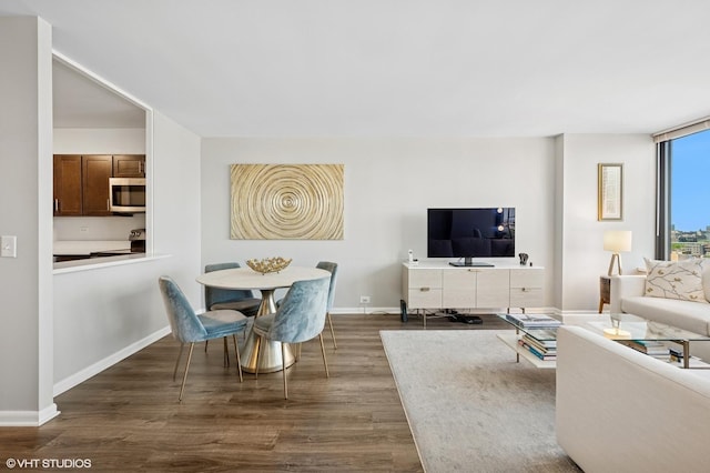 1560 N Sandburg Ter Unit 1605J, Chicago, IL 60610 - living room with dark wood-style flooring and baseboards