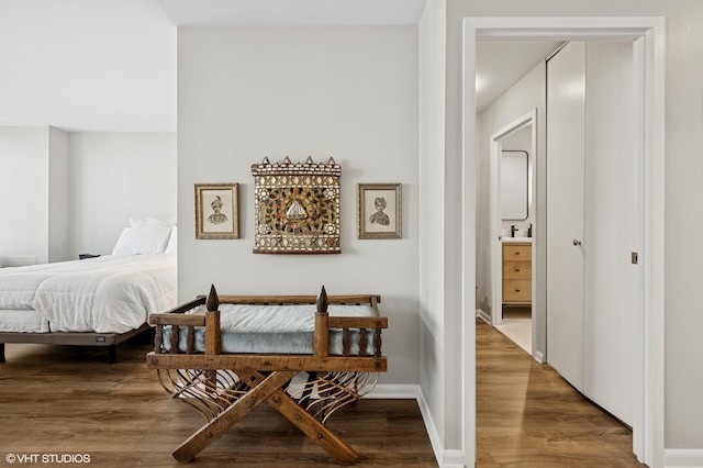 1560 N Sandburg Ter Unit 1605J, Chicago, IL 60610 - bedroom with wood finished floors and baseboards