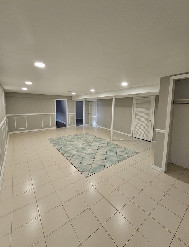 3912 W Hayford St, Chicago, IL 60652 - finished below grade area with recessed lighting, a decorative wall, and light tile patterned floors