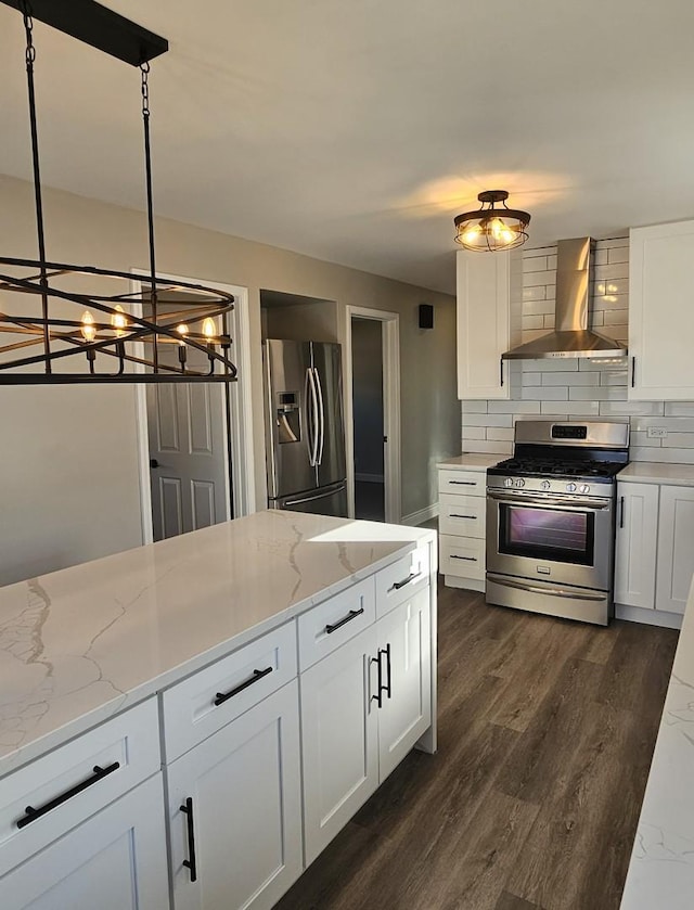 3912 W Hayford St, Chicago, IL 60652 - kitchen featuring wall chimney exhaust hood, stainless steel appliances, decorative backsplash, and white cabinets