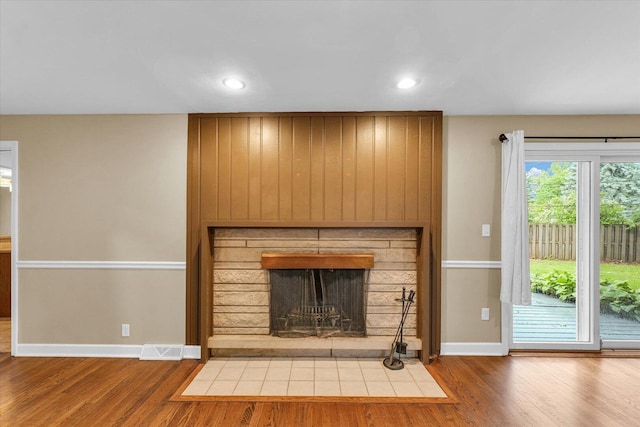 1204 Mayfair Rd, Champaign, IL 61821 - detailed view of wood finished floors, a fireplace, and recessed lighting