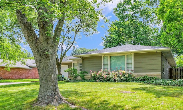 1204 Mayfair Rd, Champaign, IL 61821 - view of front of property featuring a garage