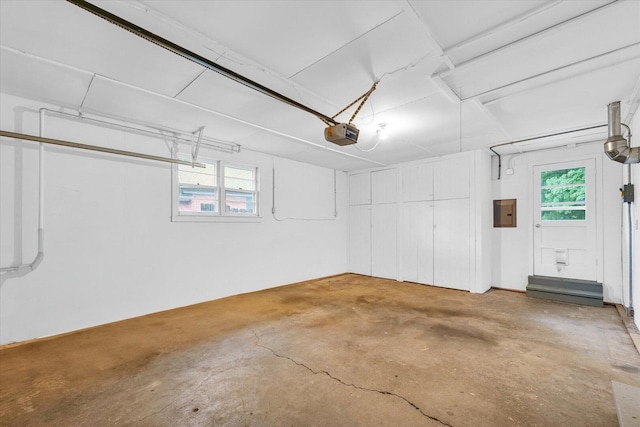 1204 Mayfair Rd, Champaign, IL 61821 - garage with a garage door opener