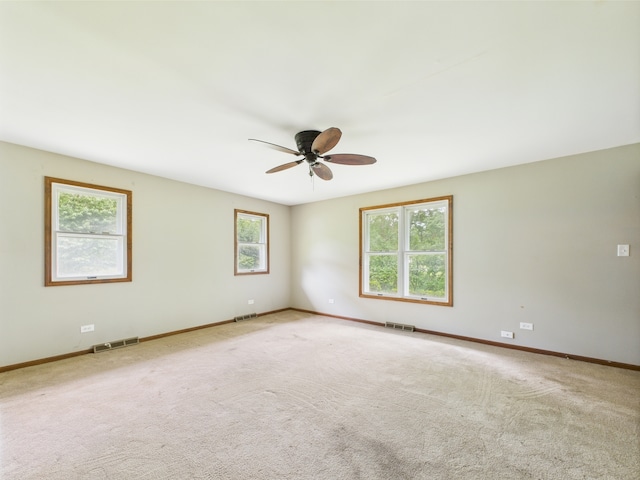 2208 Fiesta Dr, Joliet, IL 60432 - carpeted spare room with ceiling fan and baseboards