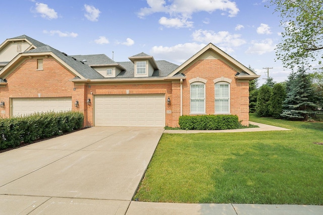 1250 Ashbury Pl Unit 1250, Lemont, IL 60439 - view of front of house with brick siding, a front yard, driveway, and a shingled roof