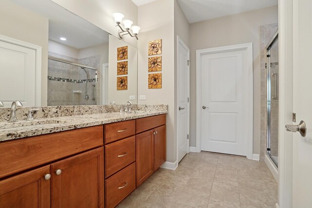 1250 Ashbury Pl Unit 1250, Lemont, IL 60439 - full bath with a stall shower, double vanity, baseboards, and tile patterned flooring