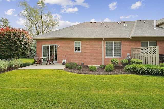 1250 Ashbury Pl Unit 1250, Lemont, IL 60439 - rear view of house featuring a patio, roof with shingles, brick siding, and a lawn