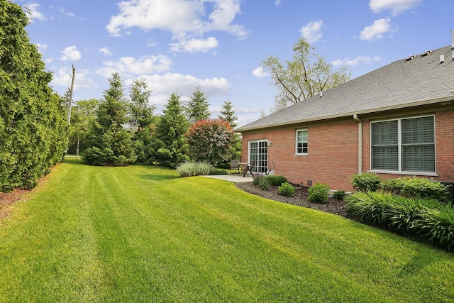 1250 Ashbury Pl Unit 1250, Lemont, IL 60439 - view of grassy yard with a patio area